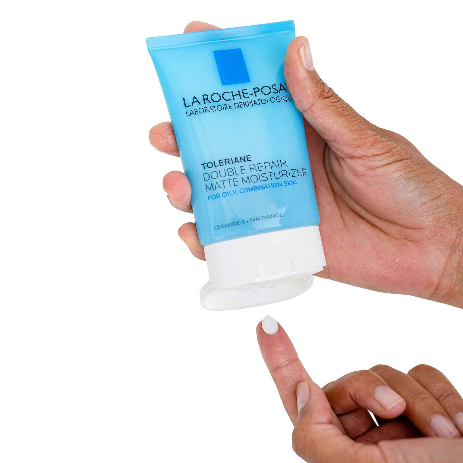toleriane-double-repair-matte-face-moisturizer-for-oily-skin-s9 la-roche-posay-toleriane-matte-lotion-on-finger.jpg